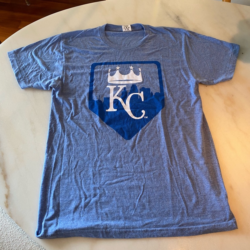 Charlie Hustle KC Blue tshirt unique design with crown and skyline
